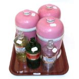 Three 19th century porcelain apothecary jars and covers with titled plaques, pink ground (a.f.);