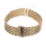 A 9 carat gold fancy link bracelet, length 18cm . Gross weight 28.2 grams