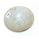 A Chinese celadon glaze bowl, possibly Song dynasty, incised cloud decoration, 17cm diameter