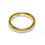 A 22 carat gold band ring, finger size O. Gross weight 9.0 grams.