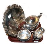 A three-piece George V silver tea-service and an associated George V silver salver, the service by