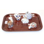 A Royal Crown Derby Imari palette Field Mouse paperweight; with two Rabbits; a piglet; and a Cat (