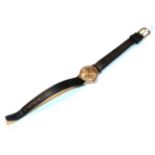 A 9 carat lady's Tudor Oyster wristwatch, leather strap
