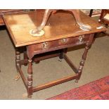 An 18th century oak side table with single drawer