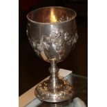 A Victorian silver goblet, by Robert Hennell, London, 1867, the bowl chased with fruiting