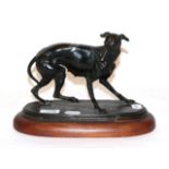 A bronzed model of a greyhound