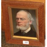 British School (early 20th century) Portrait of a gentleman wearing glasses, head and shoulders, oil