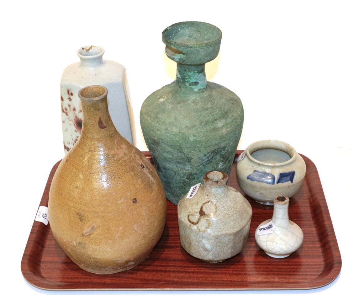 A collection of Korean ceramics and a bronze, some 18th/19th century