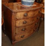 A Regency mahogany bow fronted chest of drawers, with fluted pilasters and raised on bracket feet,