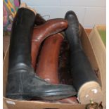 Two pairs of leather riding boots with boot trees; and a group of fur