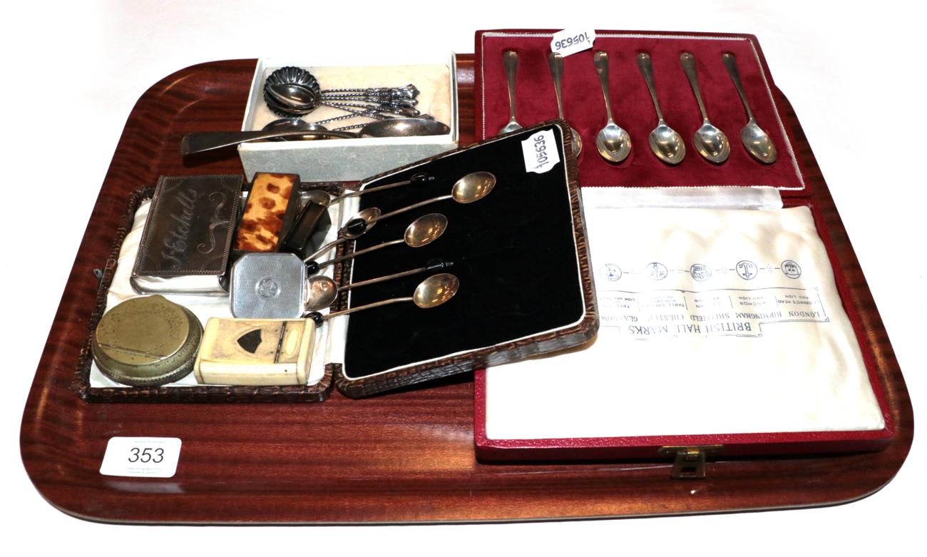 A collection of assorted silver flatware, including three cased sets of teaspoons, one set with wood