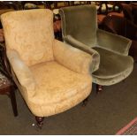 Two Victorian armchairs raised on turned legs with castors