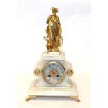 An onyx striking figural mantel clock