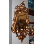 A Victorian gilt and gesso girandole mirror