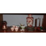 A Japanese Kutani vase; an octagonal malachite box; a pair of Eastern copper and brass mugs; a
