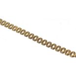 A 9 carat gold brick link necklace, length 44cm . Gross weight 34.0 grams.