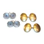 A pair of oval cufflinks, each stamped '9' and '.375'; and a pair of mother of pearl and sapphire