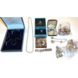 A quantity of silver jewellery including bracelets, necklaces, pendants, brooches etc