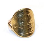 A bent sovereign ring (worn), finger size O. Shank stamped '9CT'. Gross weight 8.6 grams.