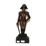 A painted cast iron doorstop figure of the Duke of Wellington, stepped base