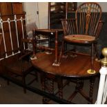 A provincial 18th century armchair; a cane seated beech armchair; an ash ladder back chair; and an