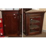 A George III oak hanging corner cupboard, with fluted stiles; and a glazed oak example (2)