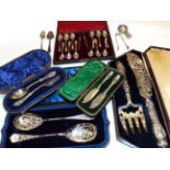 A quantity of various silver flatware, including: a cased pair of fish-servers; a cased set of