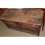 An early 18th century oak coffer carved with the initials M.N
