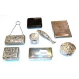 A collection of various silver boxes and objects of vertu, comprising: an oblong dressing table box;