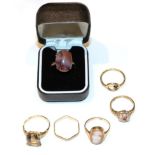 A cameo ring, stamped '9CT', finger size M; a 9 carat gold hexagonal shaped band ring; a 9 carat