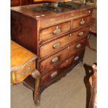 A Regency mahogany chest of drawers, with two short drawers over three long drawers, raised on