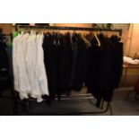 A large quantity of assorted circa 1950 and later gents evening jackets, tail coats, morning