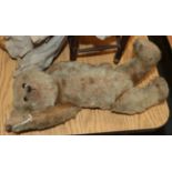 Circa 1920s jointed teddy bear, in light brown mohair with boot button eyes, stitched nose and