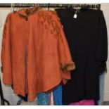 Modern Raff rust coloured poncho, of panelled design with mink trims to the collar and cuffs and