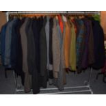 A large quantity of assorted circa late 1940's-60's gents costume including over coats, jackets,