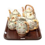 Victorian Japanese style tea wares comprising of four various sized teapots and a jug (5)