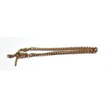 A graduated curb link watch chain, each link stamped '9' and '375', length 31cm . Gross weight 30.