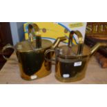 Two graduated Victorian brass water cans (2)