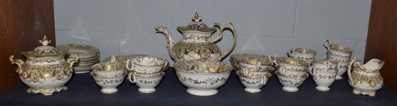 A 19th century part tea service with teapot, milk jug, sugar bowls etc