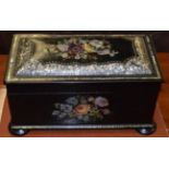 A Victorian papier mache tea caddy