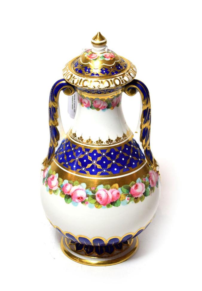 A 19th century Royal Crown Derby twin-handled porcelain covered vase, decorated with flowers and