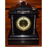 A Victorian black slate and marble mantel timepiece