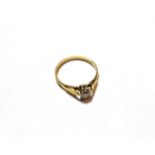 An 18 carat gold round brilliant cut diamond solitaire ring, estimated diamond weight 0.40 carat