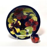 A modern Moorcroft Hibiscus bowl, together with a small Moorcroft Poppy pot (2)