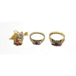 An 18 carat gold ruby and diamond three stone ring, finger size R; a 9 carat gold ruby and diamond