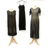 A 1920's Black Beaded Sleeveless Dress, the chiffon ground embellished with a geometric design of