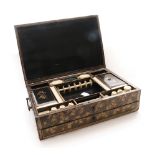 A 19th Century Chinese Export Lacquered Work Box, decorated in black and gilt, with brass carrying
