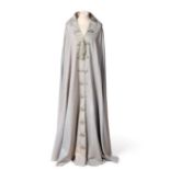 An Early 20th Century Liberty Eau de Nil Wool Cape, with a cream silk lining, stylised Art Nouveau