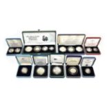 The 1997 Four-Coin Silver Proof Britannia Set, 1994 Three-Coin Silver Proof Set along with the