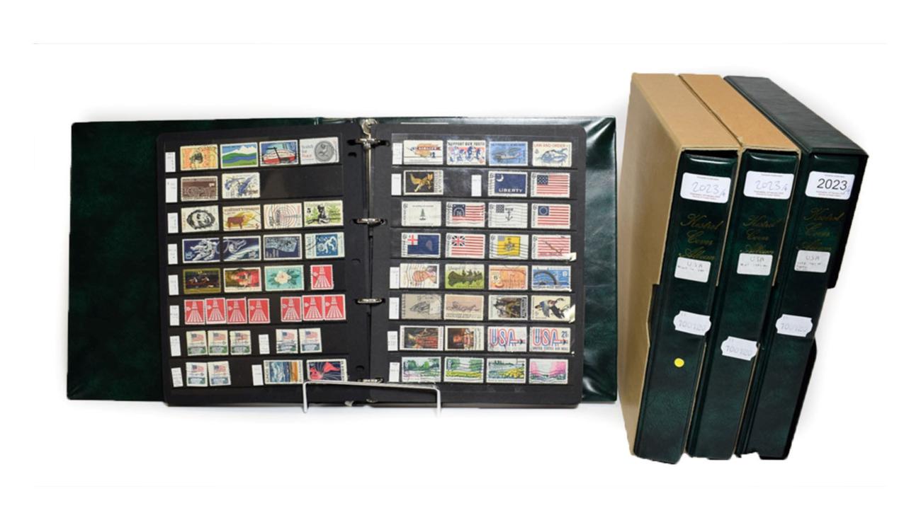 USA 4 Boxed Albums with slip cases. A dealer's stock both mint and used, many 1000s Mint in two